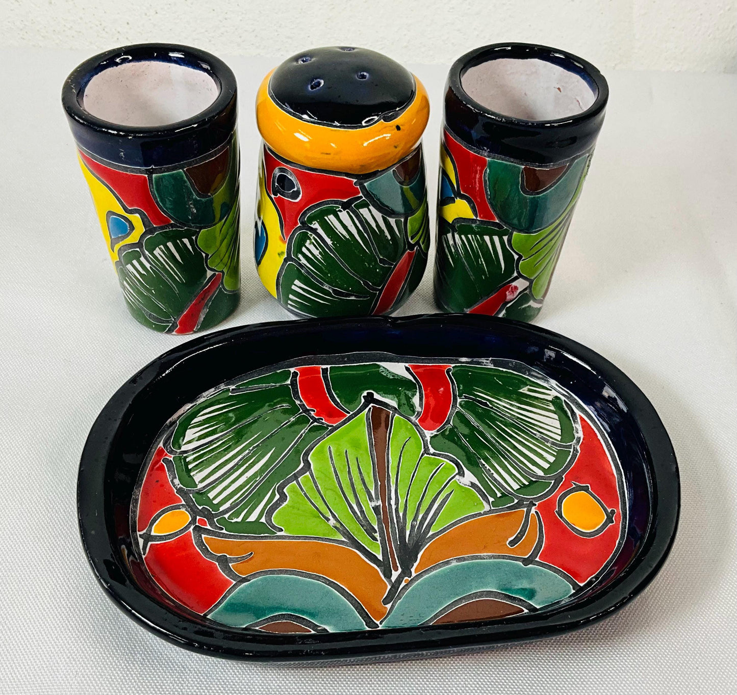 Set of tequila glasses with salt shaker