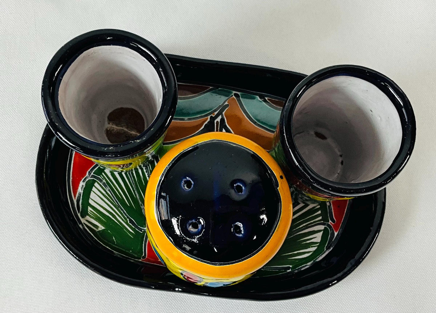 Set of tequila glasses with salt shaker