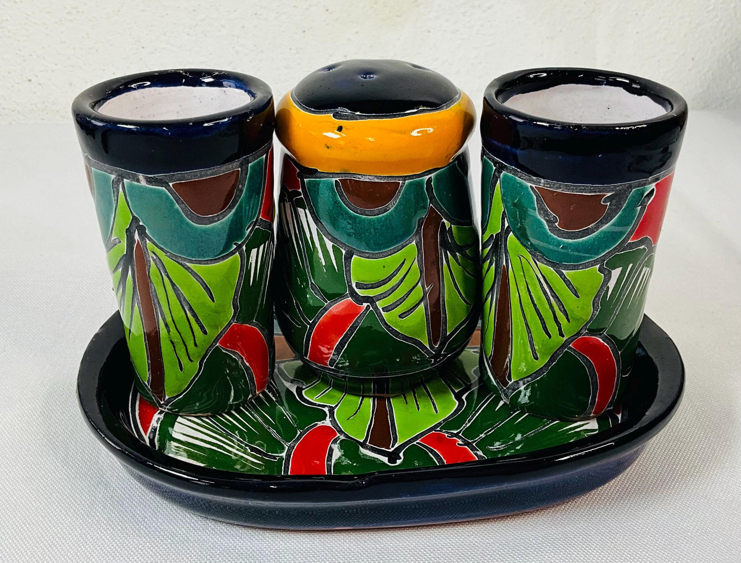 Set of tequila glasses with salt shaker