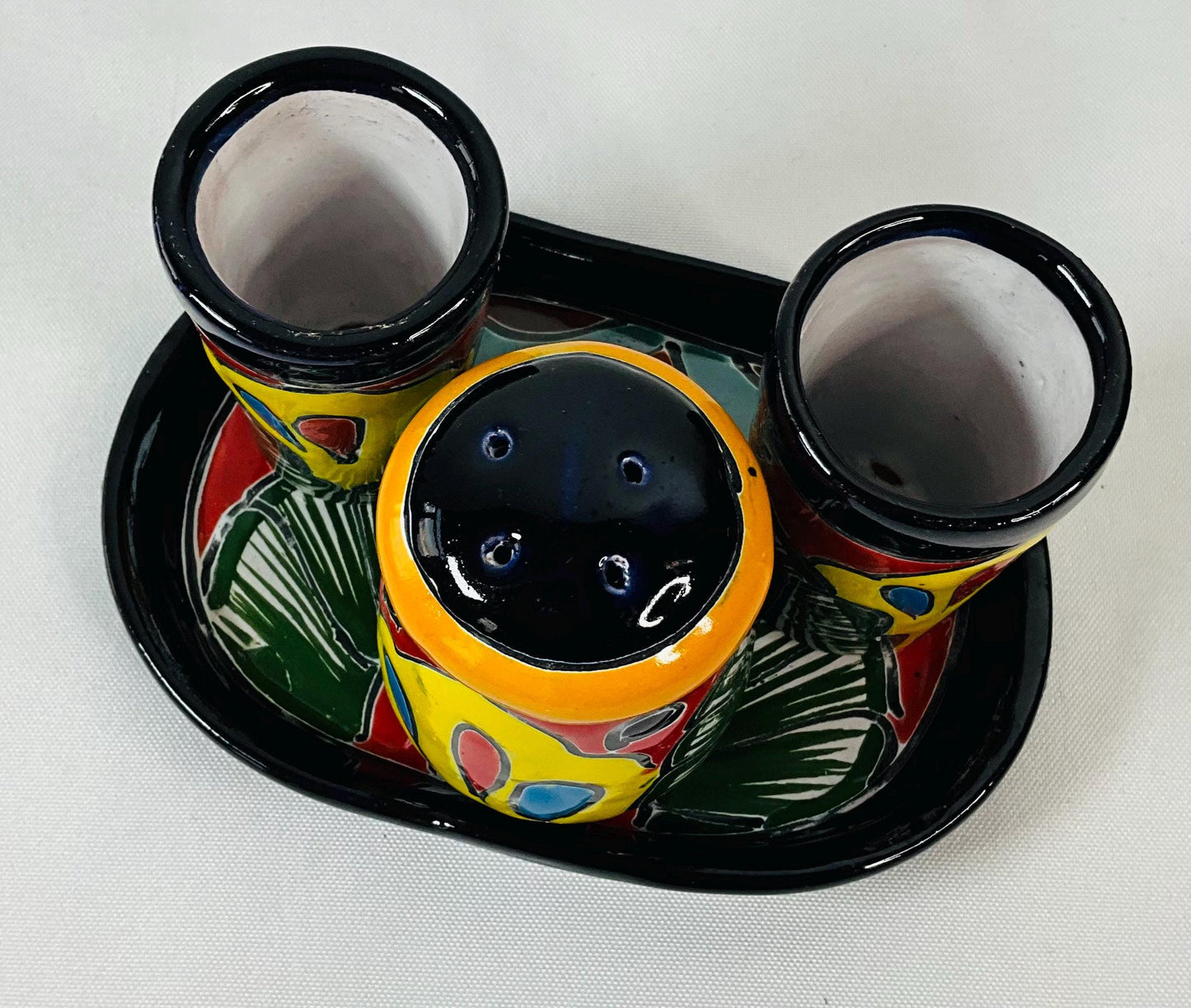 Set of tequila glasses with salt shaker