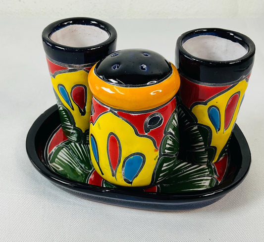 Set of tequila glasses with salt shaker