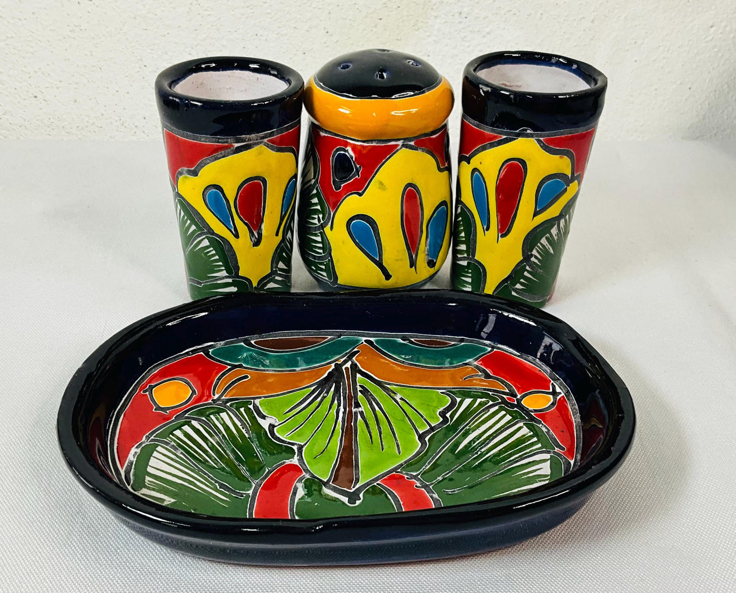 Set of tequila glasses with salt shaker